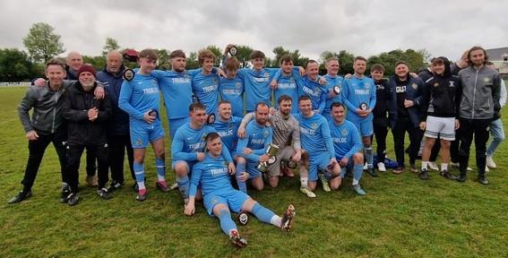 Division 4 Cup winners New Hedges Saundersfoot United celebrate